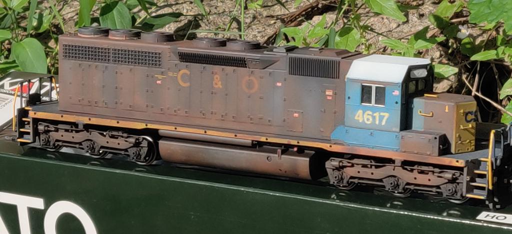 Kato EMD SD40 CSX #4617 in the infamous tattered C&O paint scheme. Painted, weathed & detailed all in shop.